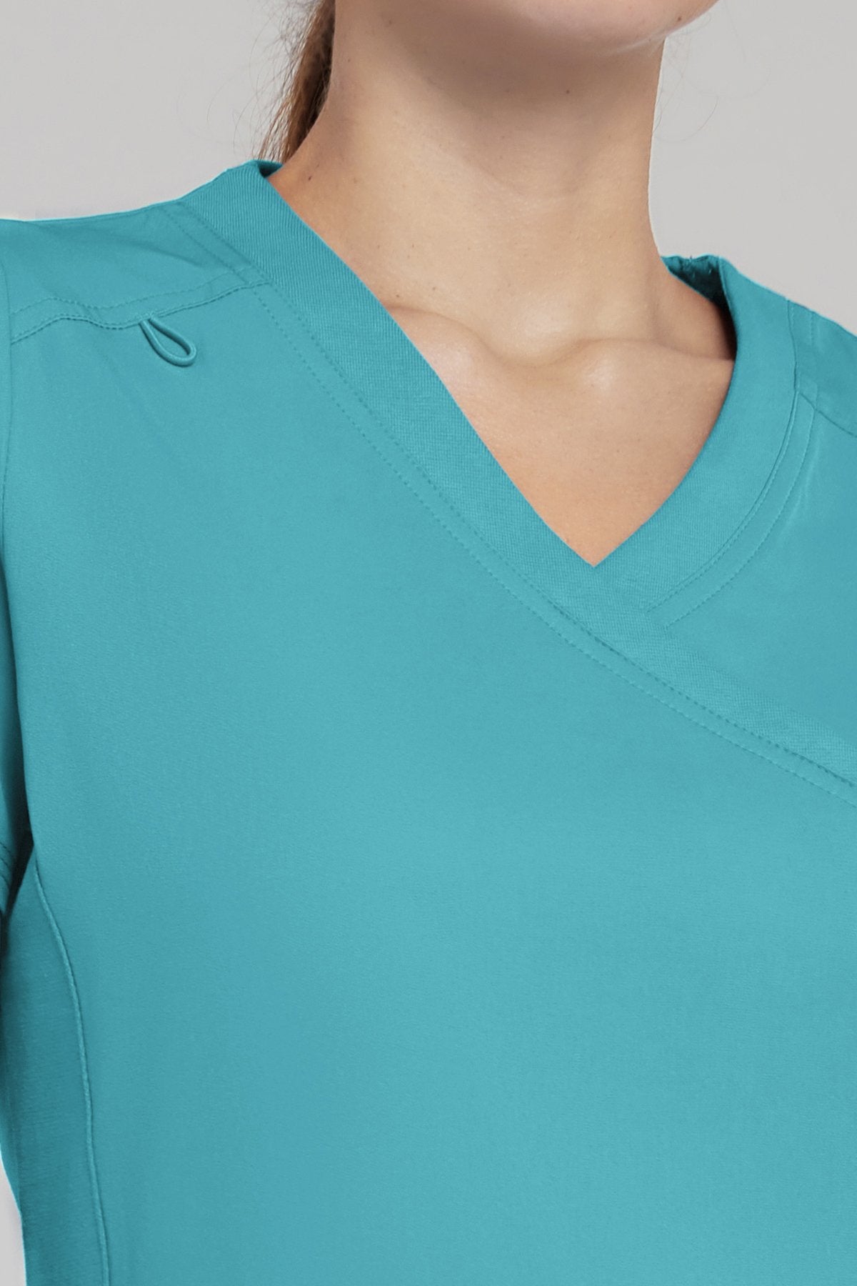 Medichic Teal Mock Wrap Top - April